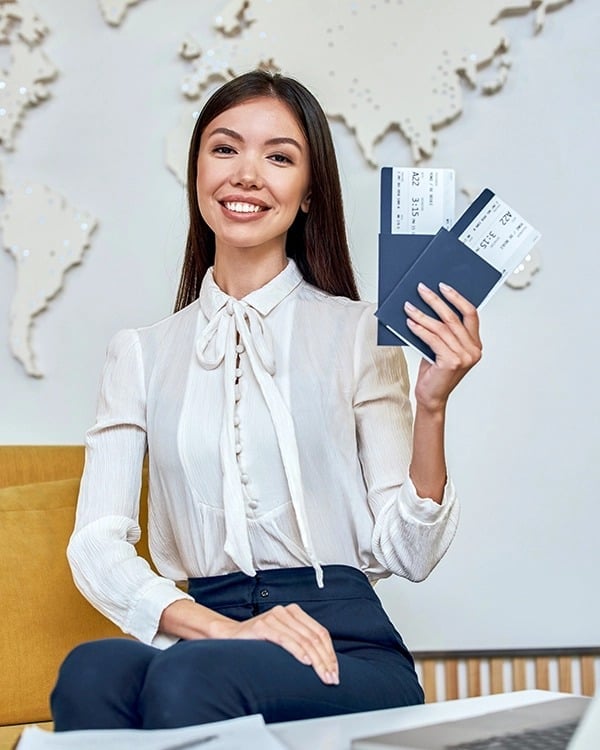 Young Woman Travel Agent With